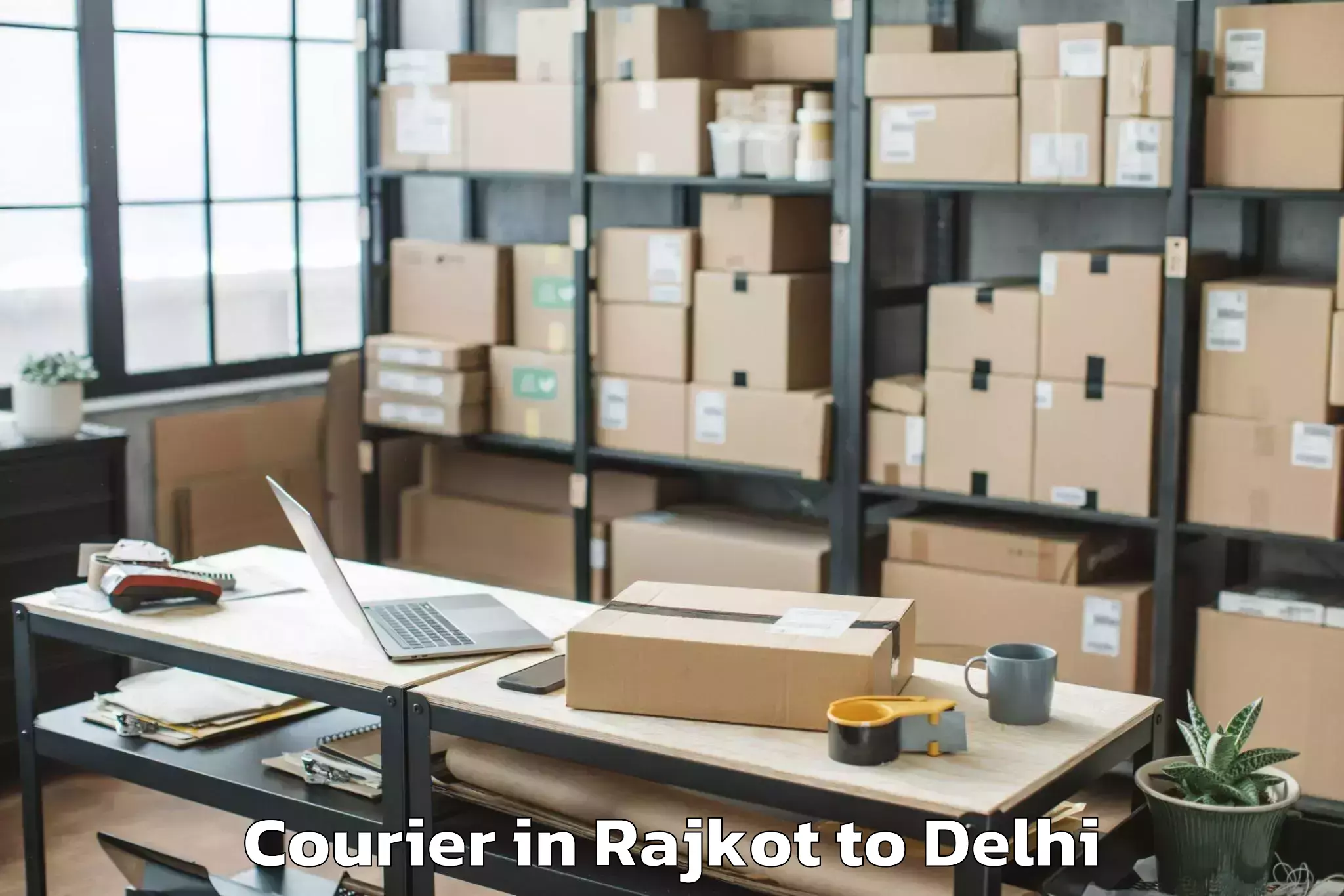 Get Rajkot to Flatted Factory Complex Okhla Courier